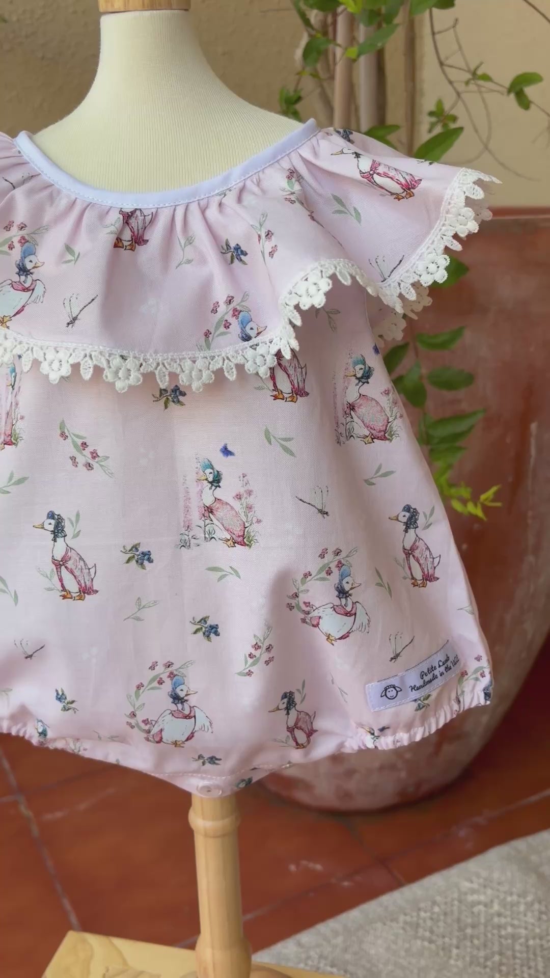 Puddle duck ruffle collar romper